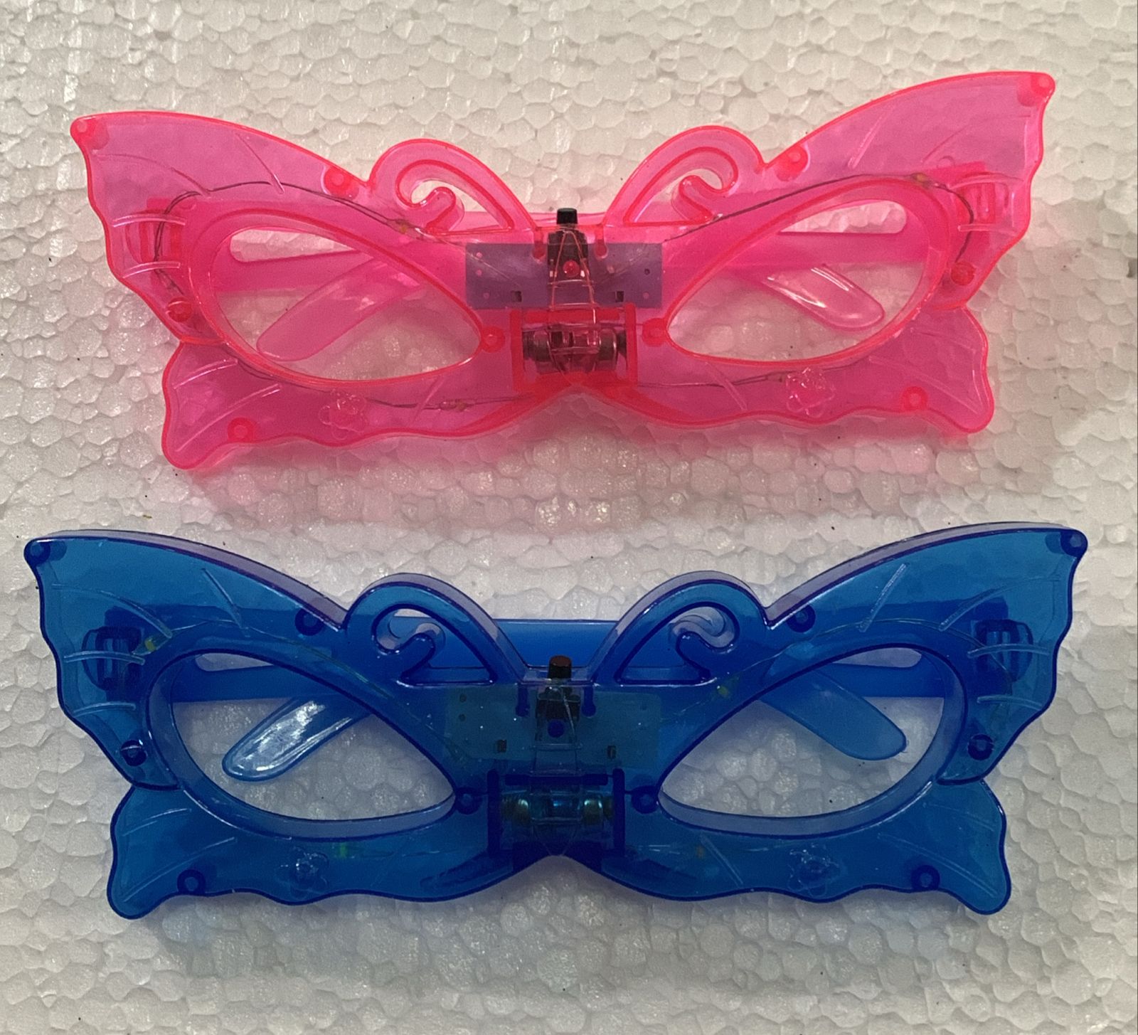 LENTE CON FORMA DE MARIPOSA